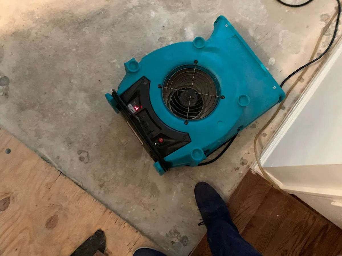 Air mover drying subfloor during Leak Detection & Repair in Chula Vista